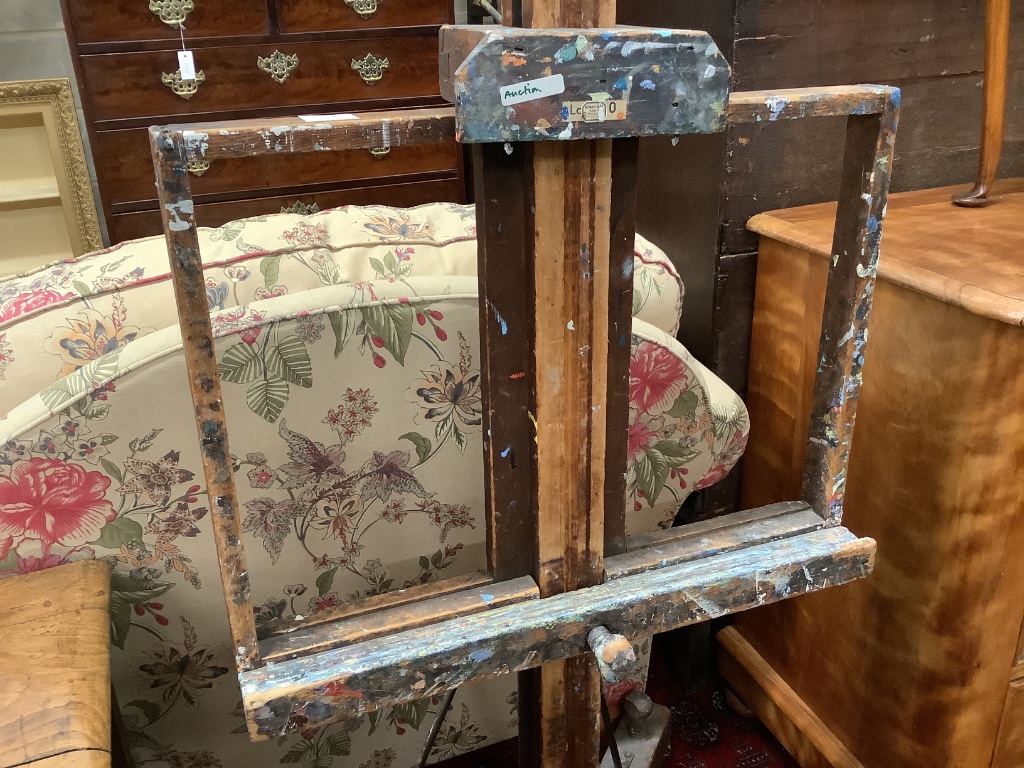 An Edwardian adjustable studio easel, width 66cm